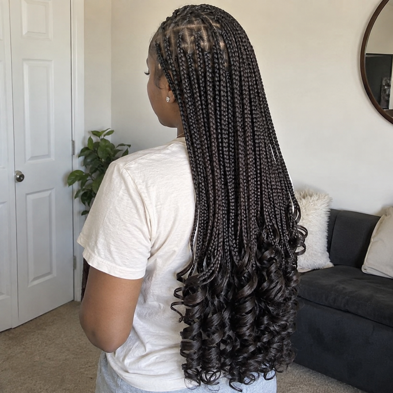 French Curl Braids vues de dos, tresses longues terminées par de larges boucles